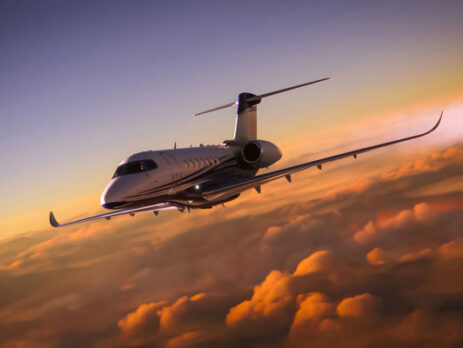 Luxury jet flying during sunset